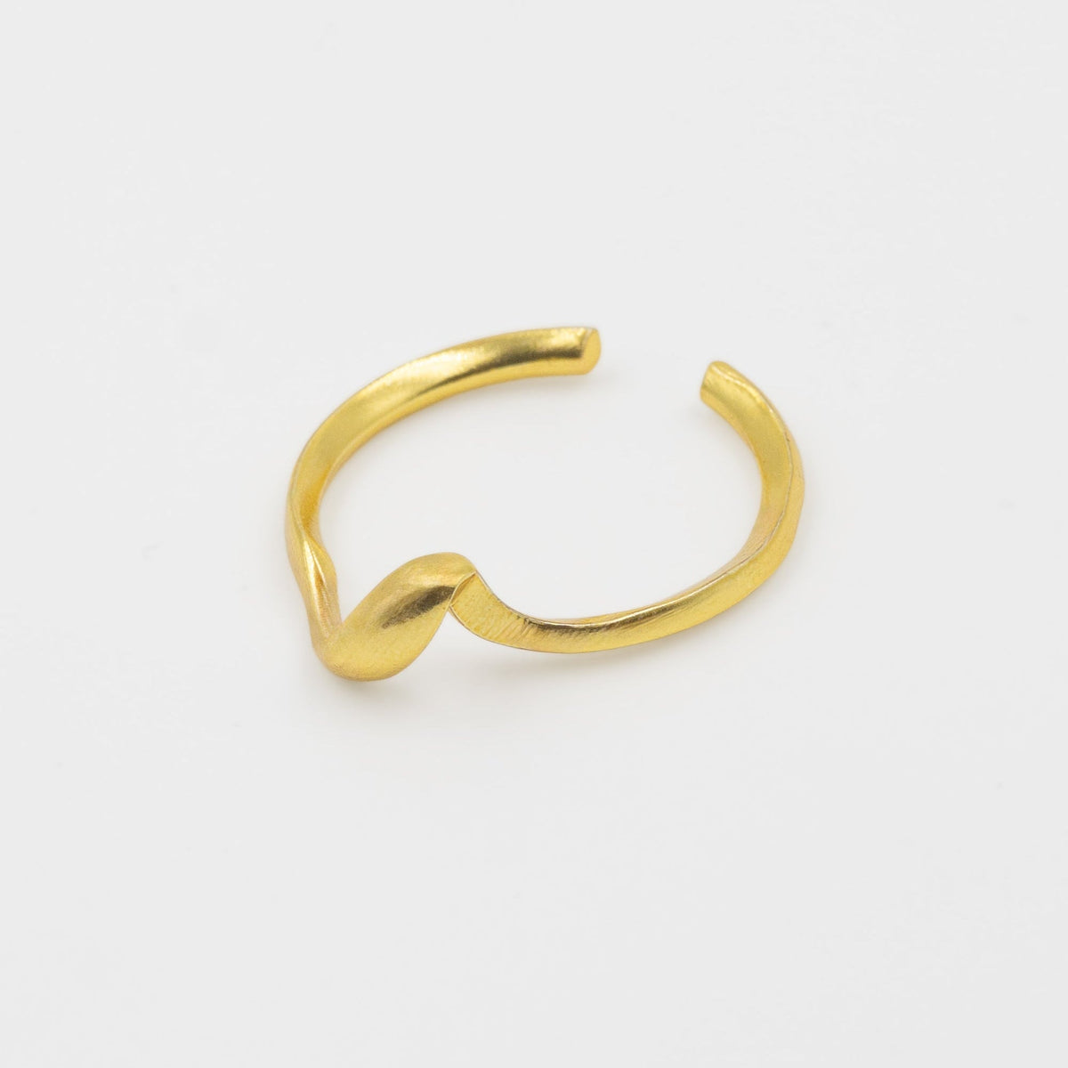 Gold ring on a white background