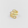 Gold spiral ring on a light gray background
