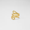 Gold spiral ring on a light gray background