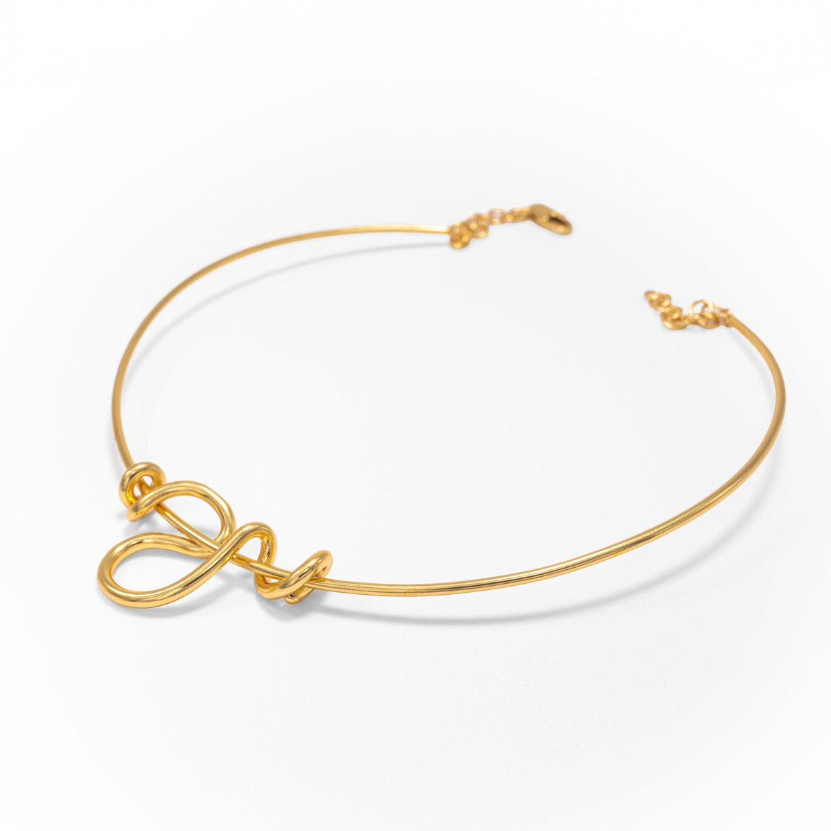 Gold necklace on a white background