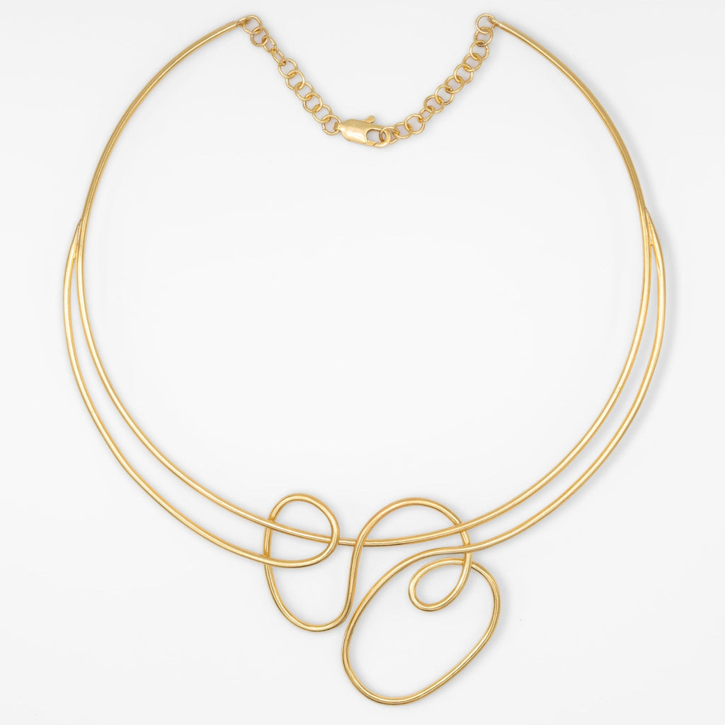 Gold necklace on a white background