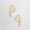 Gold hoop earrings on a white background