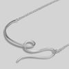 Silver necklace with a unique design on a light gray background
