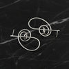 Pair of silver earrings on a black marble background