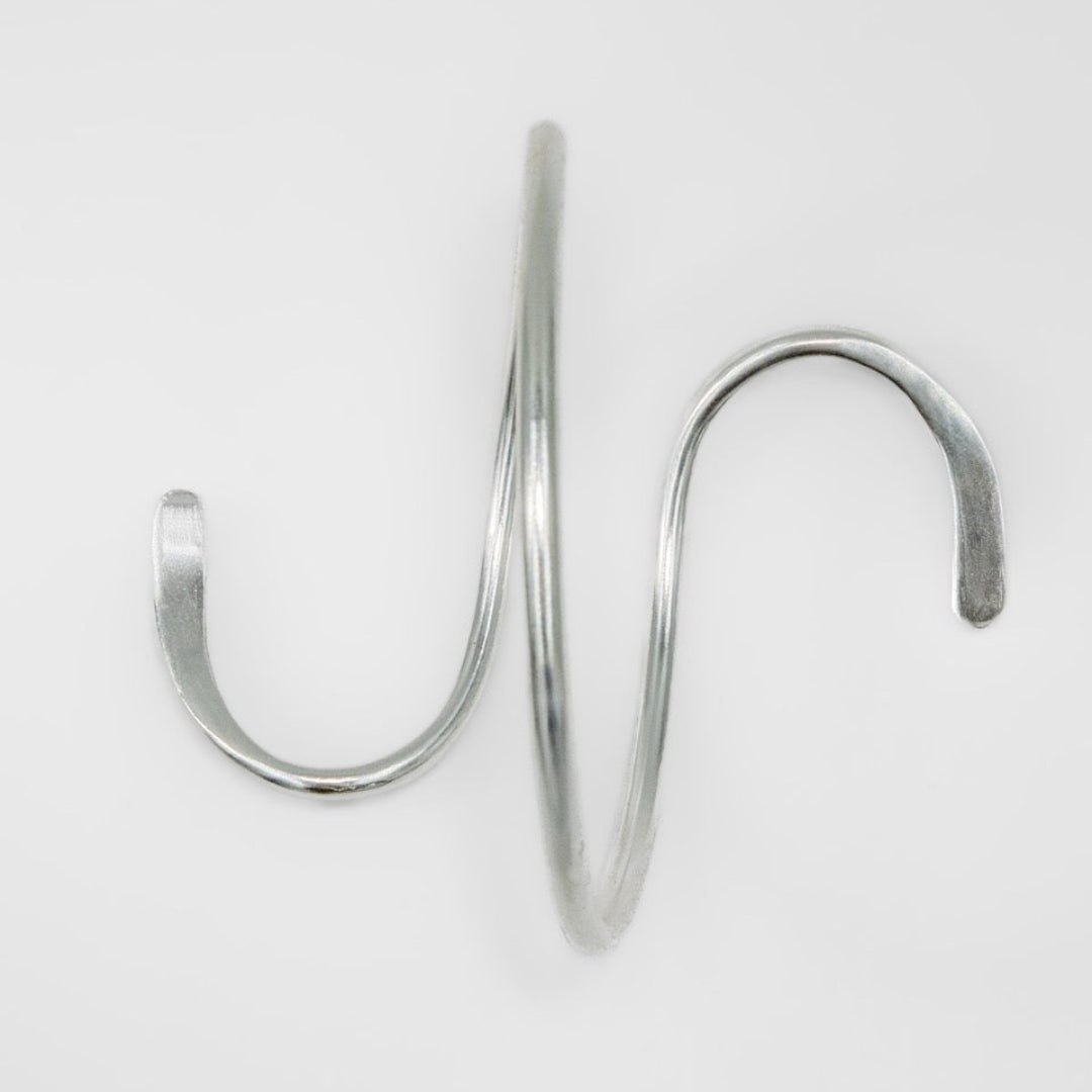 Silver bracelet on a white background